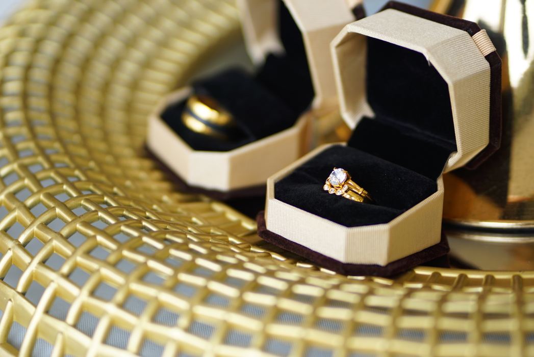 Wedding rings displayed in ring boxes
